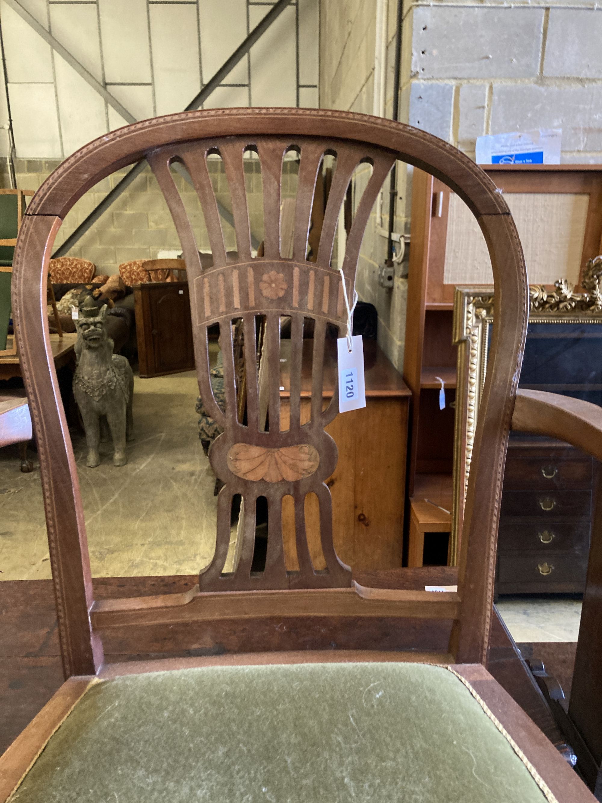 A Victorian bleached elm and ash smokers bow chair and an Edwardian inlaid mahogany elbow chair (2)